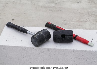 Broken And New Rubber Hammer. Fiberglass Handle Rubber Mallet. Construction Tools