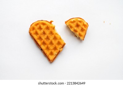 Broken Off Piece Of Heart Shaped Cookie Isolated On White Background