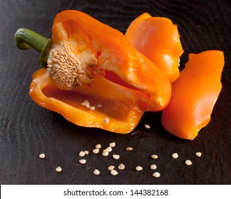 Broken Orange Bell Pepper With Seeds