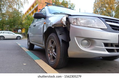 Broken passenger car close-up. Accident, car repair.