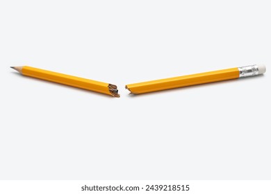 Broken pencil on white horizontal background close-up. Graphite yellow pencil, broken in the middle, a manifestation of emotions, stress, aggression, problems in studies, problems at work. - Powered by Shutterstock