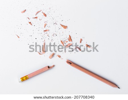 Broken Pencil on white paper
