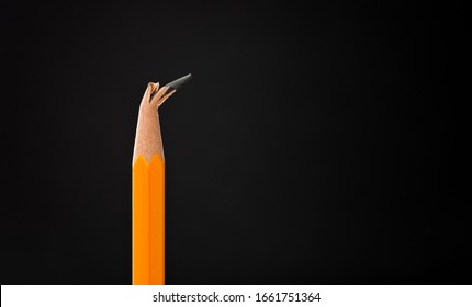 Broken Pencil Tip On Black Background.