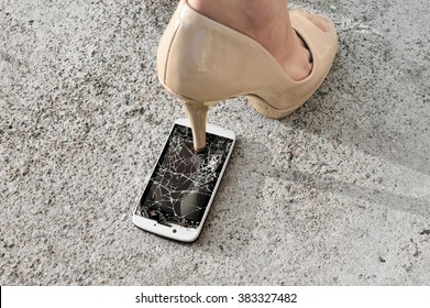 Broken phone screen from crushing by high heel shoe