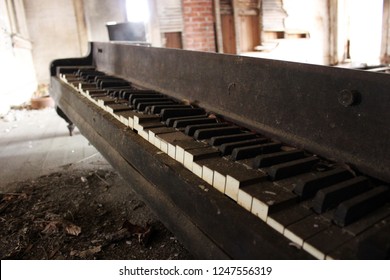 Broken piano inside of abandoned house  - Shutterstock ID 1247556319