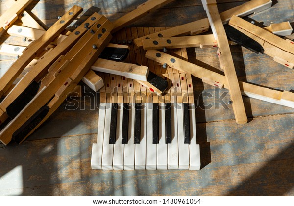 Broken Piano Keys On Wooden Floor Stock Photo Edit Now 1480961054