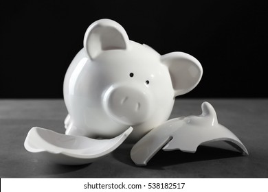 Broken Piggy Bank On Table