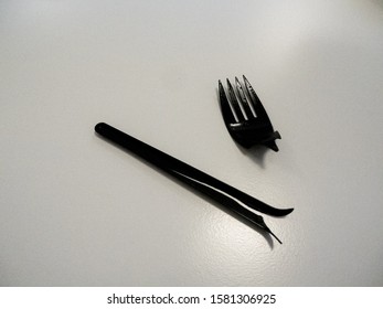 Broken Plastic Fork On A Table