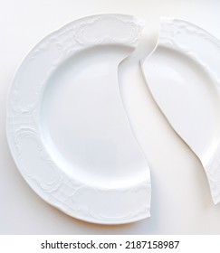 Broken Plate. White Background. Abstract.