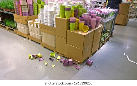 Broken pots in the flower section of the store - Shutterstock ID 1965130255