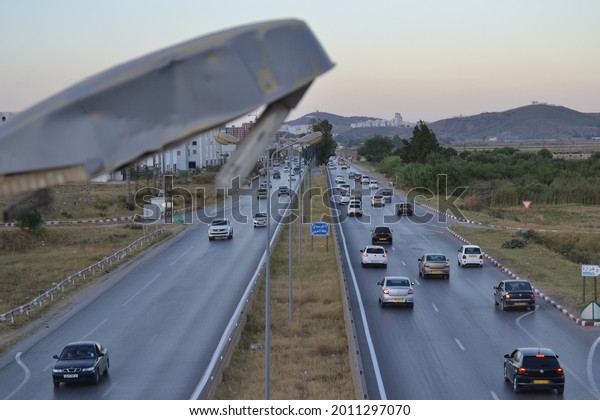 A broken public light pole on the highway.\
Annaba Algeria 18.07.2021
