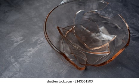 broken pyrex dish on a table.