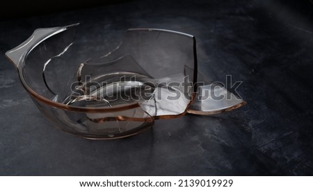 broken pyrex dish on a table.