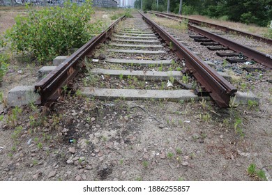 Broken Railroad Tracks In The Field, A Path Without A Beginning