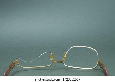 Broken Reading Glasses. Eyeglasses Without One Lens. Spectacles Close Up