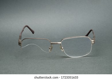 Broken Reading Glasses. Eyeglasses Without One Lens. Spectacles Close Up