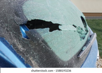 Broken Rear Window On Car In Winter Time