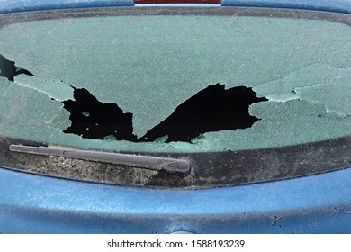 Broken Rear Window On Car In Winter Time