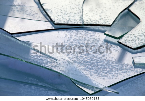 Broken rear
windshield of a bus on the
snow
