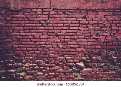 Broken Red Brick Wall In Eerie Atmosphere.