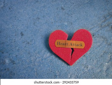 Broken Red Heart With A Bandaid And Heart Attack Text                               