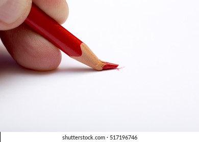 Broken Red Pencil.