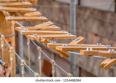 Broken Rope Bridge In Indoor Adventure Park As Concept For Balance In Business And Finance