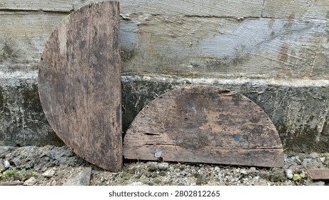broken round table piece, made from 2 unique and historical semi-circular pieces of wood