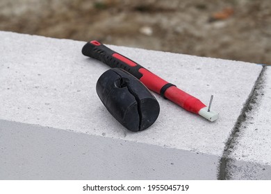 Broken Rubber Hammer. Fiberglass Handle Rubber Mallet. Construction Tools Service