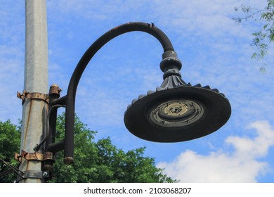 Broken And Rusty Streetlight Isolated Blue Sky Background