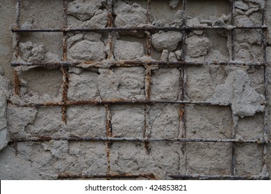 Broken Shattered Concrete Slab With Metal Rusty Armature Texture Background.