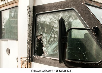 Broken Side Glass Of Armored Bank Truck Closeup