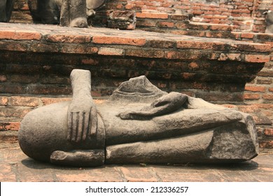 Broken Statue In A Temple