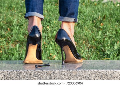 Broken Stiletto Heel On The Shoes Wearing On Your Feet
