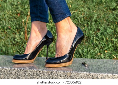 Broken Stiletto Heel On The Shoes Wearing On Your Feet
