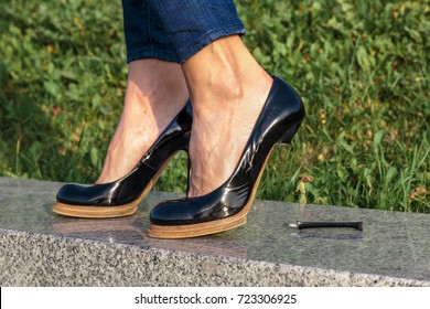 Broken Stiletto Heel On The Shoes Wearing On Your Feet
