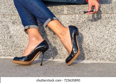 Broken Stiletto Heel On The Shoes Wearing On Your Feet
