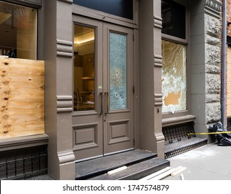 Broken store window after New York black live matters protest