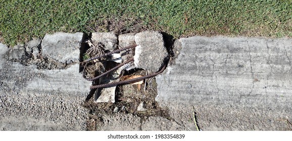 A Broken Storm Water Drain In A Roadside Gutter. Beenleigh QLD Australia. May 2021