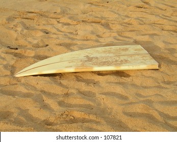 Broken Surfboard At Waimea