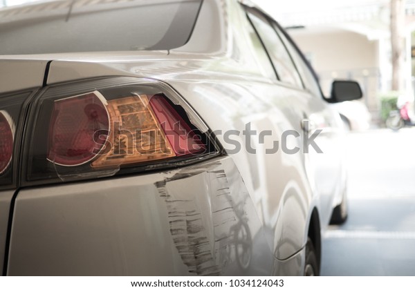 Broken Tail Lamp: concept of accident, car\
crash, insurance