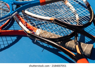 Broken Tennis Rackets Blue Tennis Court