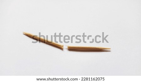 Broken Toothpick on a white background