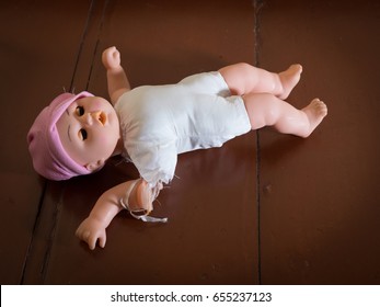 broken doll toy