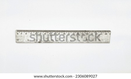 Broken transparent ruler on white background