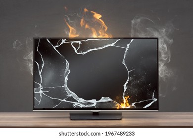 Broken TV Screen With Smoke And Fire