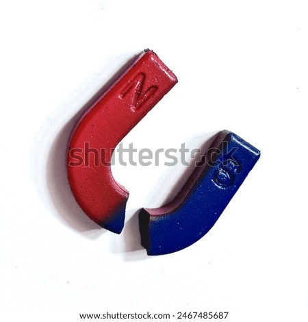 Broken U-shaped magnet split into two isolated
