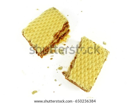 Similar – Image, Stock Photo Remains of the wafer of an empty bitten ice cream cone on gray pavement in spring sunshine in the old town of Detmold in East Westphalia-Lippe, Germany