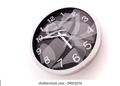 Broken Wall Clock Over A White Background