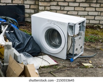 Broken Washing Machine In Dump.